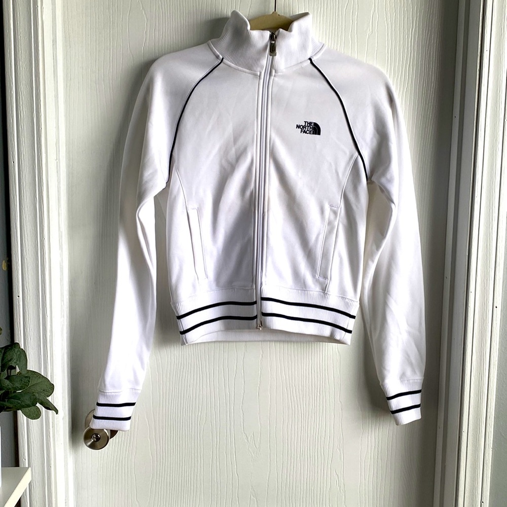 North Face zip up jacket. White with navy detail. Size:XS
